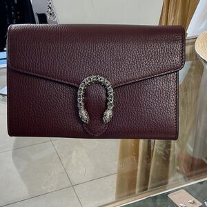 Chic Maroon Leather Clutch with Silver Accent